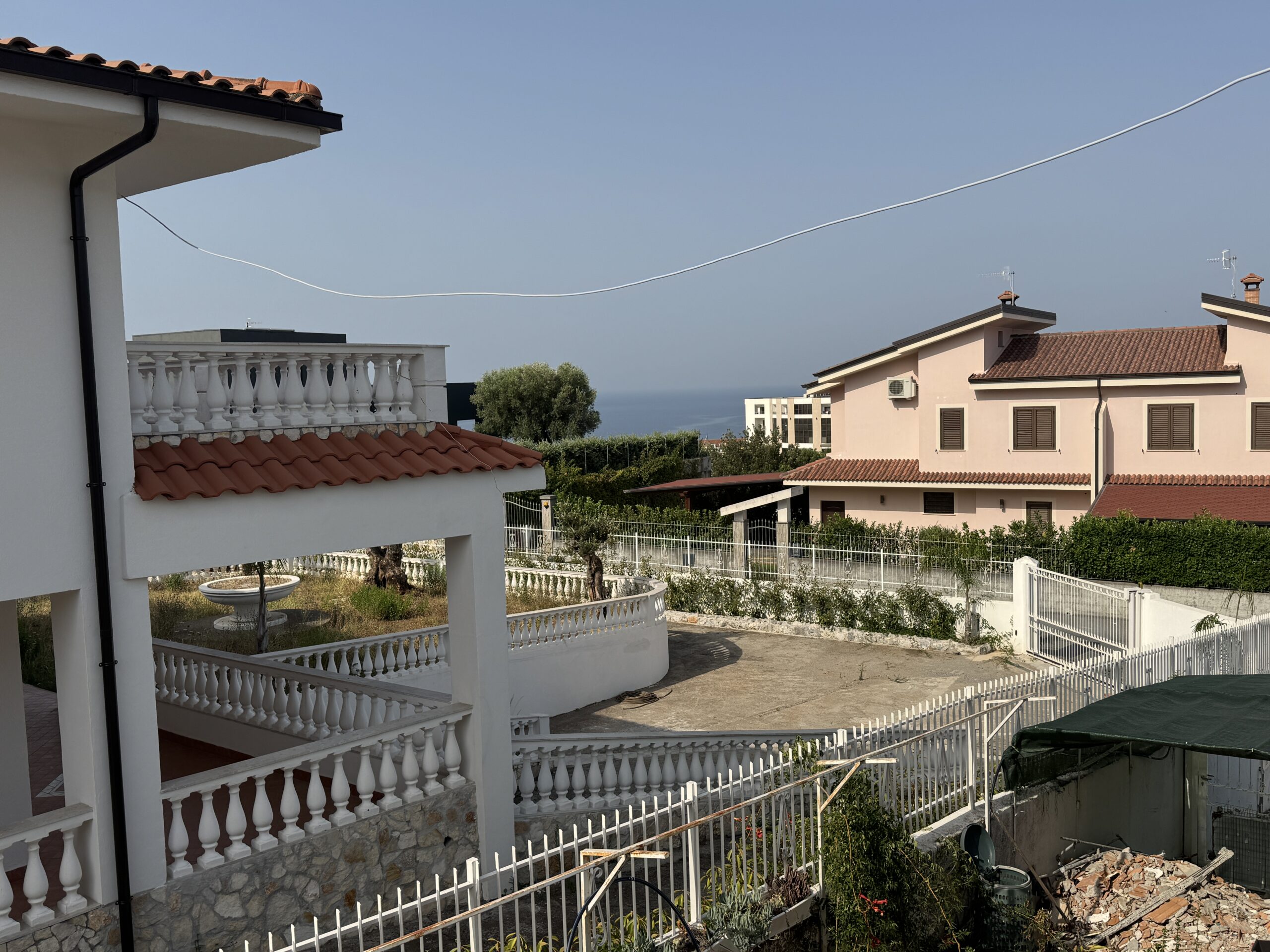 A two-storey house with a spacious garden